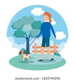 young woman with dog in the park