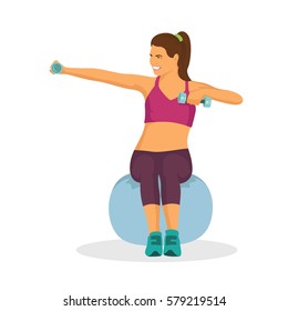 Young woman doing exercise using dumbbell and rubber ball
