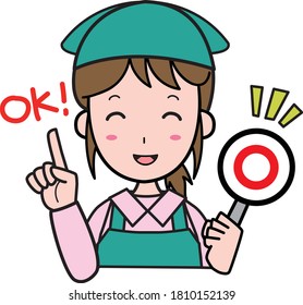 Young woman doing housework with an OK sign