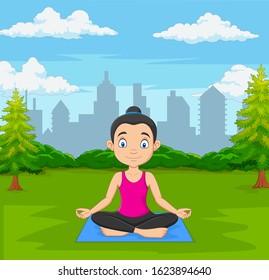 Young woman doing meditation in green city park