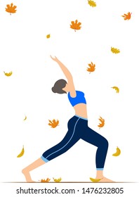 Young woman doing yoga. Autumn leaves background. Fall down autumn leaves.