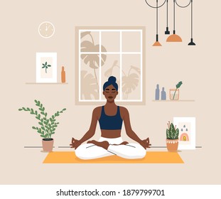 Young woman doing yoga exercises, practicing meditation on lotus pose on the mat. Black female character practicing in yoga studio or home. Trendy flat vector illustration. svg