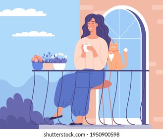 Young woman drinking coffee on her balcony apartment with cute cat