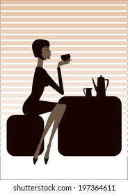 The young woman drinks tea in cafe.