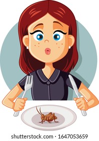 Young Woman Eating a Cricket for Healthy Proteins. Girl surprised by exotic high-protein grasshopper dinner 
