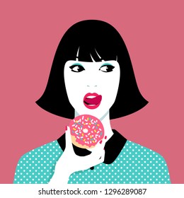 Young woman eating donut against pink background