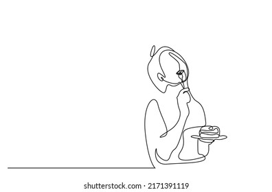 a young woman eats a slice of cake with a fork and is happy with the taste