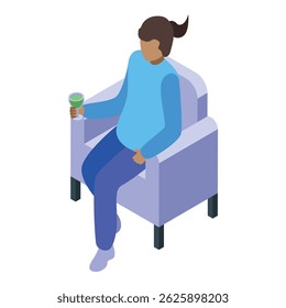 Young woman is enjoying a relaxing moment in an armchair, savoring a refreshing drink