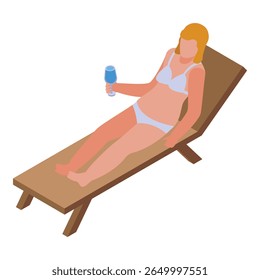 Young woman is enjoying a relaxing vacation day, sunbathing on a beach sunbed and holding a refreshing cocktail