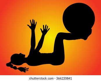 young woman exercise with pilates ball