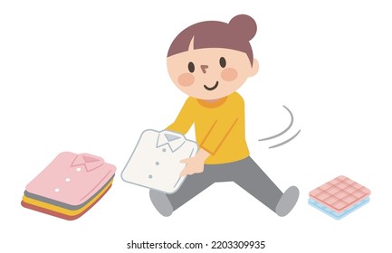 Young Woman Folding Laundry While Stretching