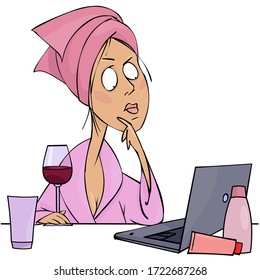 Young woman with a glass of wine and a laptop