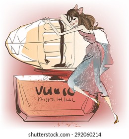 young woman with grand bottle of perfume