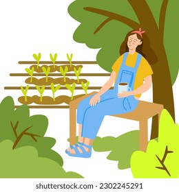 a young woman has planted seedlings and is resting in the shade of a tree, drinking coffee. the concept of agriculture, work in the garden