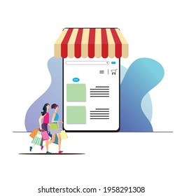 Young woman with her friend on the shopping cart chooses goods on the Internet. Application for online shopping with a phone. Program for making purchases via the Internet.