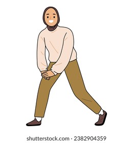 

young woman in hijab exercising gymnastics or aerobics