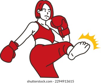 
Young woman hitting a kick in a martial arts gym