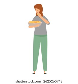 Young woman is holding a bowl of potato chips and eating one