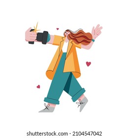 A young woman holding a camera and making selfie self portrait. Taking pictures and social network concept