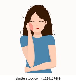 young woman holding her cheek because of toothache (bad tooth), dental care and dentistry concept