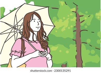 young woman holding a parasol
