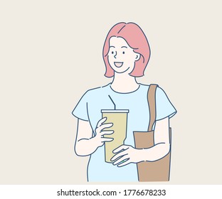 Young woman holding a reusable coffee tumbler. Hand drawn in thin line style, vector illustrations.