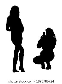 Young woman holds a smartphone in her hand. Isolated silhouettes of people on a white background
