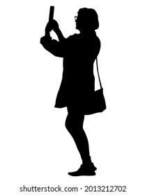 Young woman holds a smartphone in her hand. Isolated silhouettes of people on a white background