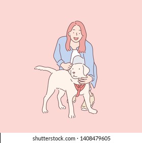 Young woman hugging and playing with a pet on their hands. Hand drawn style vector design illustrations.