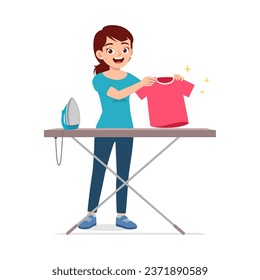 young woman ironing clean clothes and feel happy