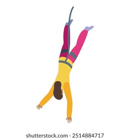 Young woman is jumping upside down, secured by a bungee jumping rope attached to her legs