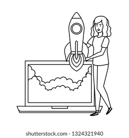 young woman with laptop and rocket