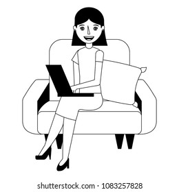 young woman with laptop sitting in the sofa