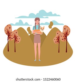 young woman lifting cute dog mascot in the field vector illustration design