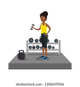 young woman lifting dumbbell
