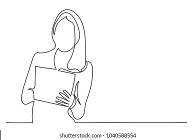 A young woman with long hair holds a tablet in her hands. One line drawing isolated vector object by hand on a white background.