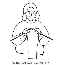 Young woman make knitted scarf