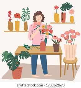Young woman making flora arrangement. Florist small business, flower shop owner.