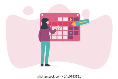 A Young Woman Marks The Date Of Menstruation In The Online Calendar. An App For Tracking Your Menstrual Cycle And Birth Control. 