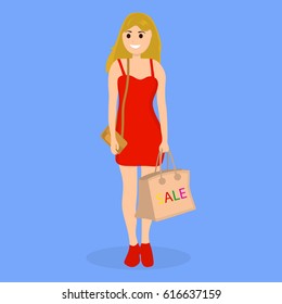 Young woman on a shopping sale with a bag