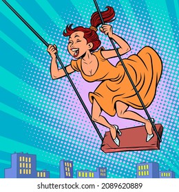 a young woman on a swing, laughing and having fun, flying over the city