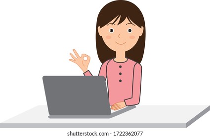 Young woman operating a laptop.