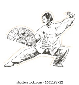 Young Woman with Ornamental Hand Fan Standing and Practising Martial Art. Chinese Culture and Judo Sport Exercising