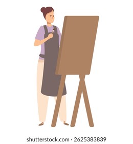 Jovem mulher está pintando em uma tela grande em seu estúdio de arte, ela está segurando um pincel e está pronta para criar uma obra-prima