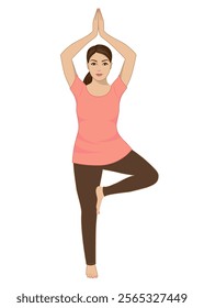 Young woman performing Tree pose yoga position.