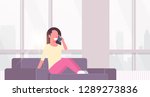 young woman phone calling happy girl sitting couch using smartphone communication concept modern living room interior cityscape background flat horizontal