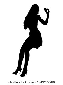 Young woman with phone on a white background