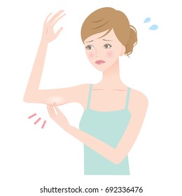 young woman pinching fat on her upper arm/woman’s upper arm fat