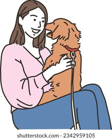 young woman playing with dog
