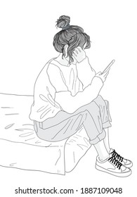 A young woman playing on the phone at the condo